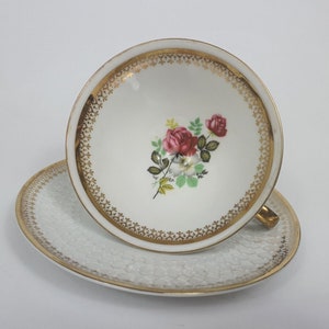 Old collector&#39;s cup, collectible place setting, porcelain, gold rim, floral motif, winterling vintage