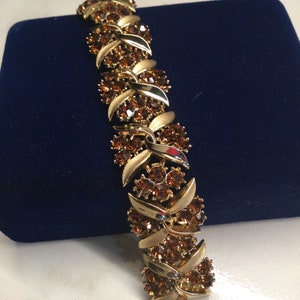 Impresionante pulsera vintage de pedrería Crown Trifari topacio chapada en oro.