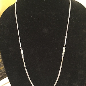 Signed MONET long chain necklace silver tone