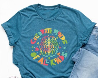 May include: A teal blue t-shirt with a rainbow brain graphic and the text "Celebrate Minds of All Kinds".