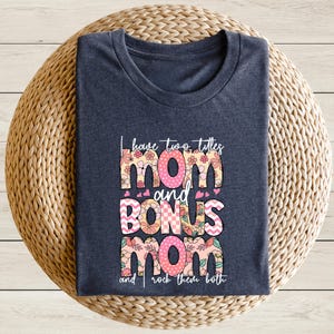 a t - shirt with the words mom and donuts mom printed on it