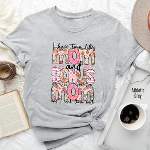 a t - shirt that says, i have three things and bones mom and i