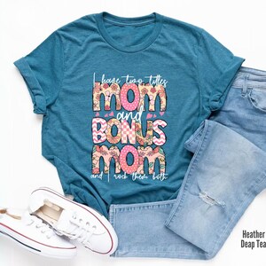 a t - shirt with the words mom and bones mom on it