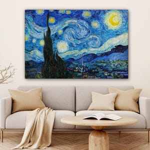 May include: A large canvas print of Van Gogh's "Starry Night" painting. The artwork features a swirling blue night sky with yellow stars and a crescent moon. A dark tree is in the foreground, with a village and mountains in the background.
