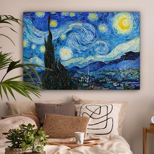 May include: A rectangular canvas print of Van Gogh's "Starry Night" painting. The artwork features a swirling blue night sky with bright yellow stars and a crescent moon. A dark, tall cypress tree is in the foreground, with a village in the background.