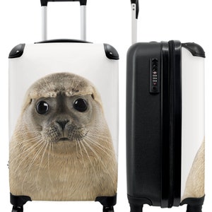 Koffer - handbagage - kinderkoffer - zeehond - jas - kinderen - hond