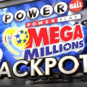 May include: A blue and white sign with the words "POWER BALL" and "POWER PLAY" in white text. The sign also has the words "MEGA MILLIONS" in red text and "JACKPOT" in gold text. The sign is advertising a lottery.