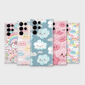 May include: Five phone cases with colourful, cartoonish designs. The cases feature patterns of rainbows, unicorns, clouds, and smiling faces in shades of pink, blue, and yellow. The cases are arranged in a row, showcasing their unique designs.