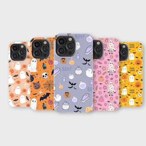 May include: A collection of Halloween-themed phone cases. Each case features a unique pattern with ghosts, pumpkins, bats, and other spooky elements. Colors include orange, purple, pink, and yellow. The cases are designed to fit a smartphone.
