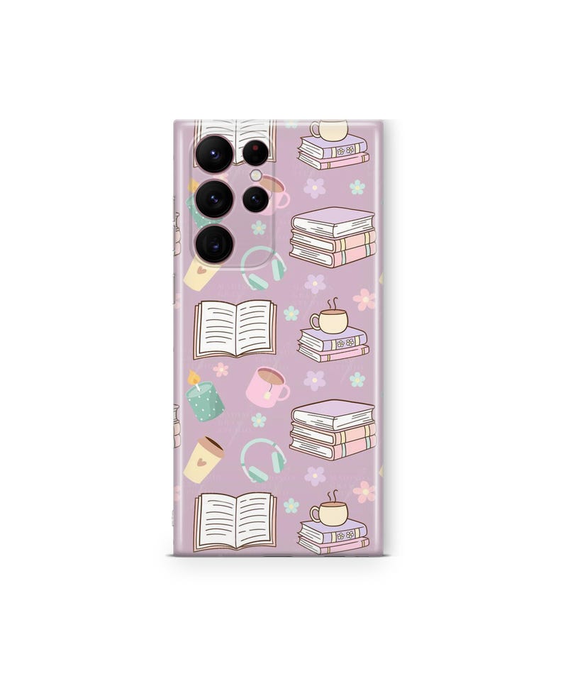 May include: A lavender phone case featuring a repeating pattern of books, coffee cups, headphones, candles, and flowers. The design is in a cartoon style with soft colors, creating a cozy and inviting aesthetic. The case is designed to fit a smartphone.