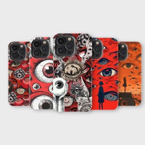 May include: Five smartphone cases arranged in a row, each featuring a distinct graphic design dominated by red, orange, and black colors. The patterns include numerous realistic and stylized human eyes, abstract shapes, and silhouettes of figures.