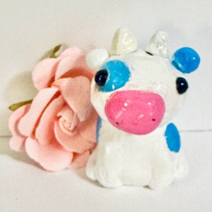 Blueberry cow clay figure