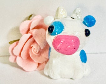 Blueberry cow clay figure