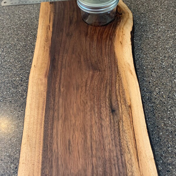 Black Walnut mini-charcuterie board with a cut out for dips and other things with a small Ball jar
