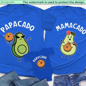 May include: Three blue t-shirts with avocado and peach illustrations. The shirts have the text "PAPACADO", "MAMACADO", and "BABYCADO" on them.