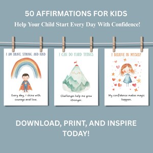 May include: Three watercolor affirmation prints for kids, clipped to a string with wooden clothespins. The prints read "I AM BRAVE, STRONG, AND KIND", "I CAN DO HARD THINGS", and "I BELIEVE IN MYSELF". The prints have colorful illustrations and inspirational text.