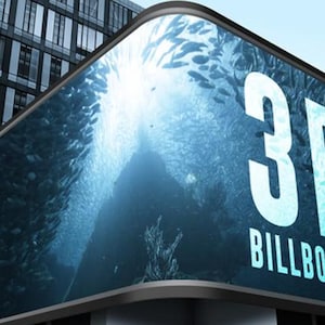 May include: A large, curved, 3D billboard with a blue and white image of a school of fish swimming underwater. The billboard text reads "3D BILLBOARD".