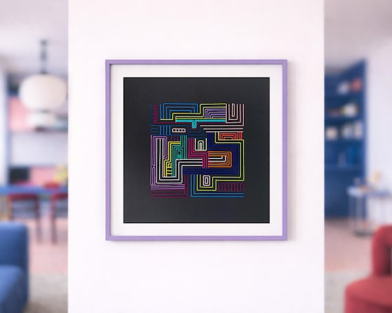 Hand-stitched circuit board patterns on textile — someone literally embroidered code paths with thread, and the result is small-batch art you'd never find in a store.