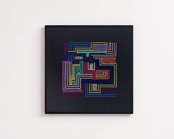 Hand-stitched circuit board patterns on textile — someone literally embroidered code paths with thread, and the result is small-batch art you'd never find in a store.