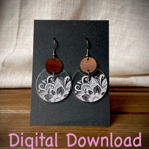 May include: A pair of clear acrylic earrings with a white floral design and a wooden accent. The earrings are displayed on a black card with the text "Digital Download".
