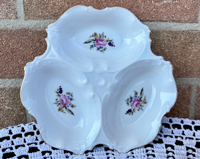 Vintage divided into three parts dish with floral design.