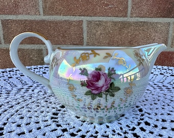 Pearlescent porcelain sauce boat. Gravy boat with gold rim  by Kahla. Made in GDR