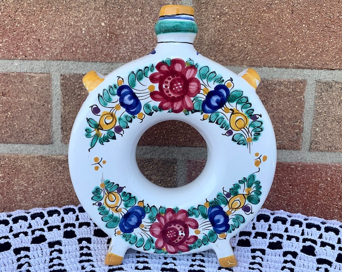 Traditional hand-painted ceramic canteen, with various ornaments on different sides