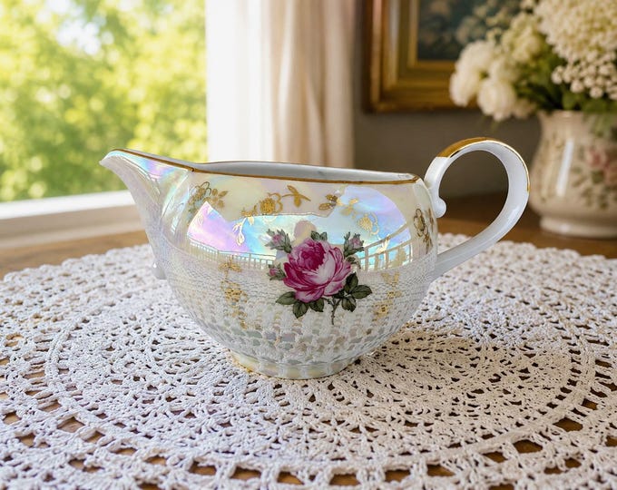 Pearlescent porcelain sauce boat. Gravy boat with gold rim  by Kahla. Made in GDR
