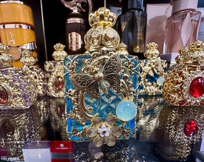 Elegant Light Blue Glass Oil Perfume Bottle with Uranium Glass Cabochon