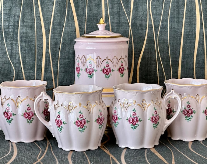 Pink Porcelain Tea Cup: Floral Design with 24K Gold Accents