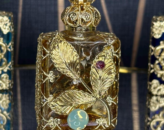 Elegant Amber Glass Oil Perfume Bottle with Gold Ornament and Uranium Glass Cabochon