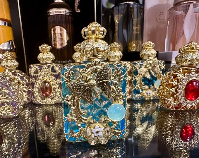 Elegant Light Blue Glass Oil Perfume Bottle with Uranium Glass Cabochon