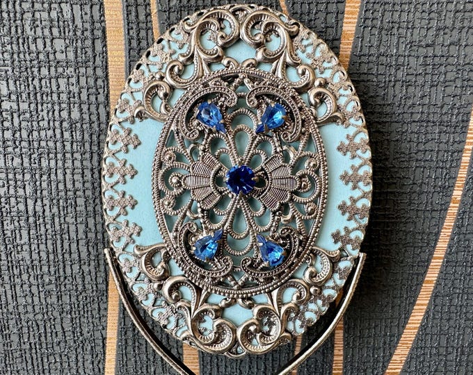 Glamorous handmade vintage mirror inlaid with blue stones