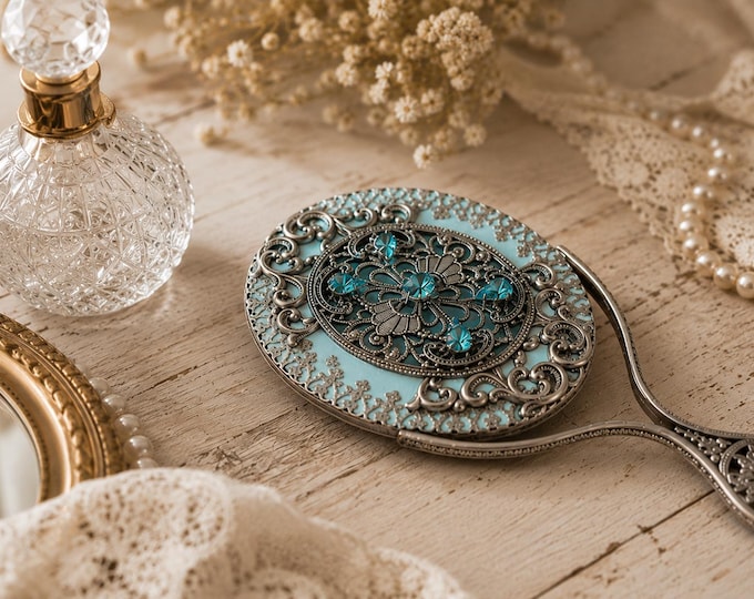 Glamorous handmade vintage mirror inlaid with light blue stones