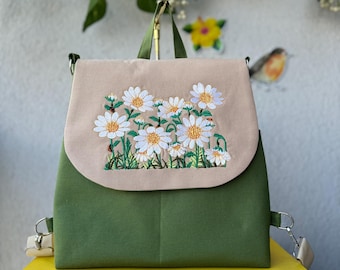 Mochila bordada personalizável com estampa floral de margaridas, impermeável, artesanal, ideal para presente feminino, estilo boho, moda personalizada.