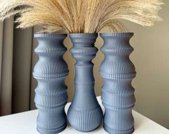Elegante 3D gedruckte Vasen-Sets, Enthüllung weiblicher Formen in 3D gedruckten Vasen-Trios, umweltfreundliche Trockenblumenvase, Wohnkultur