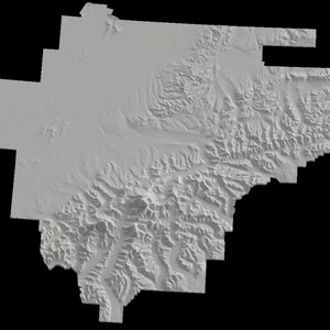 May include: A grayscale topographic map of a mountainous region. The map shows the elevation of the land with different shades of grey.