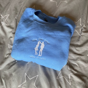 The selection Maxon and America “they slow dance when it rains” embroidered sweatshirt