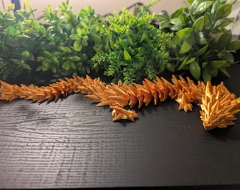Gildor Embercrest Dragon | Wingless Spineclever Dragon | Gold Collectible Dragon