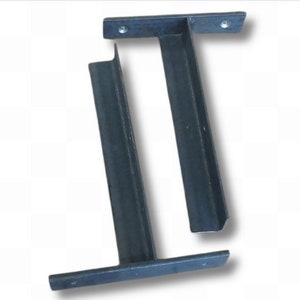 May include: Two black metal shelf brackets with a 90-degree angle. The brackets have a flat top and bottom and a vertical support in the middle.