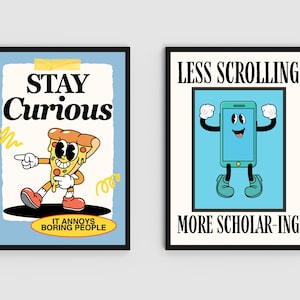 May include: Two framed art prints. The left print says "STAY Curious" with a cartoon pizza slice. The right print says "LESS SCROLLING MORE SCHOLAR-ING" with a cartoon smartphone. Both prints have black frames.
