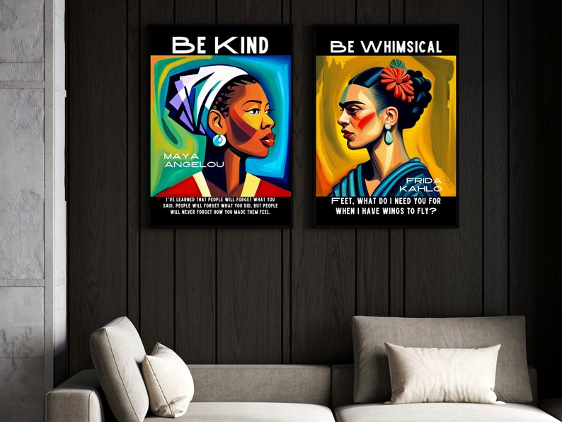 May include: Two framed art prints hang on a dark wood wall. The left print says "BE KIND" and features a portrait of Maya Angelou. The right print says "BE WHIMSICAL" and features a portrait of Frida Kahlo. Both prints have quotes.