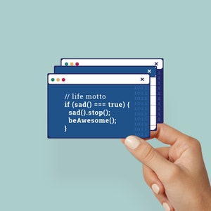 May include: A blue computer screen with code that reads "// life motto if (sad() === true) { sad().stop(); beAwesome(); }"