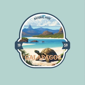 May include: A blue and white sticker with the text "National Park" and "Galapagos" in a brown font. The sticker features a cartoon illustration of a tortoise on a beach with a blue ocean and green hills in the background.