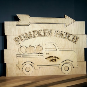 May include: Wooden sign with a cutout of a pickup truck carrying pumpkins. The sign reads "Pumpkin Patch" and "Harvest Acres Farm".