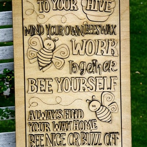 May include: A wooden sign with a honeybee theme. The sign features the text "Advice from a honey bee", "Stay close to your hive", "Mind your own beeswax", "Work together", "Bee yourself", "Always find your way home", "Bee nice or buzz off", and "Create a buzz".