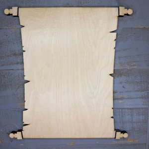 May include: A wooden scroll with a light brown finish and a distressed look. The scroll is blank and ready to be decorated.