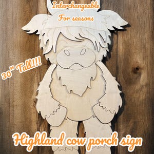 May include: A 30-inch tall wooden cutout of a Highland cow, with interchangeable seasonal decorations. The cutout is made of unfinished wood and is ready to be painted or stained.