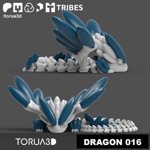 May include: A 3D printed dragon model with a blue and white color scheme. The dragon is in a curled up position with its wings spread out. The model is made up of many small, overlapping pieces.