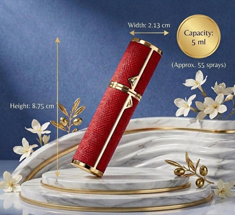 May include: A red, textured perfume atomizer with gold accents. The atomizer is 8.75 cm tall and 2.13 cm wide, with a capacity of 5 ml (approx. 55 sprays). The design includes gold trim and a decorative gold element.